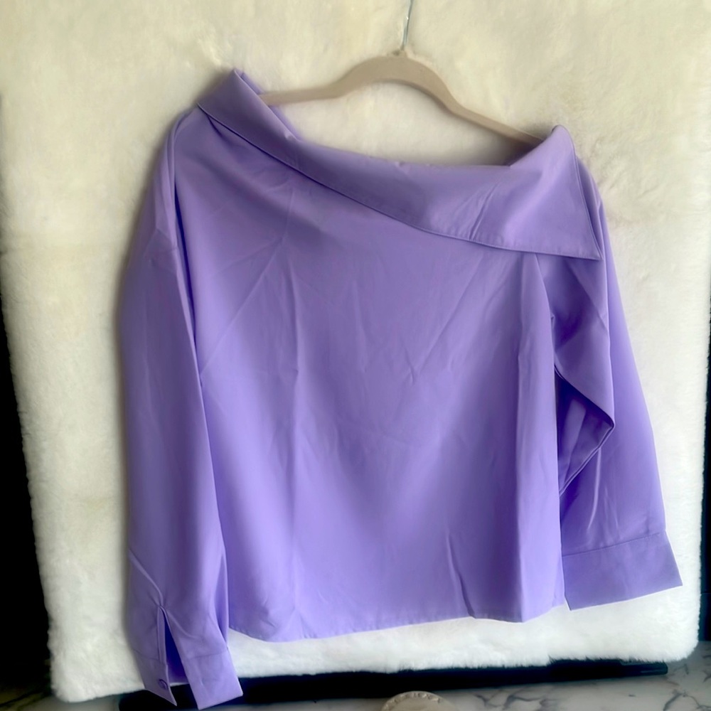 Lavender colored off the shoulder, long sleeve shirt
